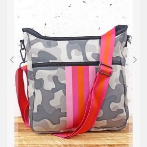 Neoprene Crossbody bag w/ guitar strap. Ultra light weight with zipper top. NWOT